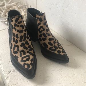 Black leather and fur boots. These are killer!